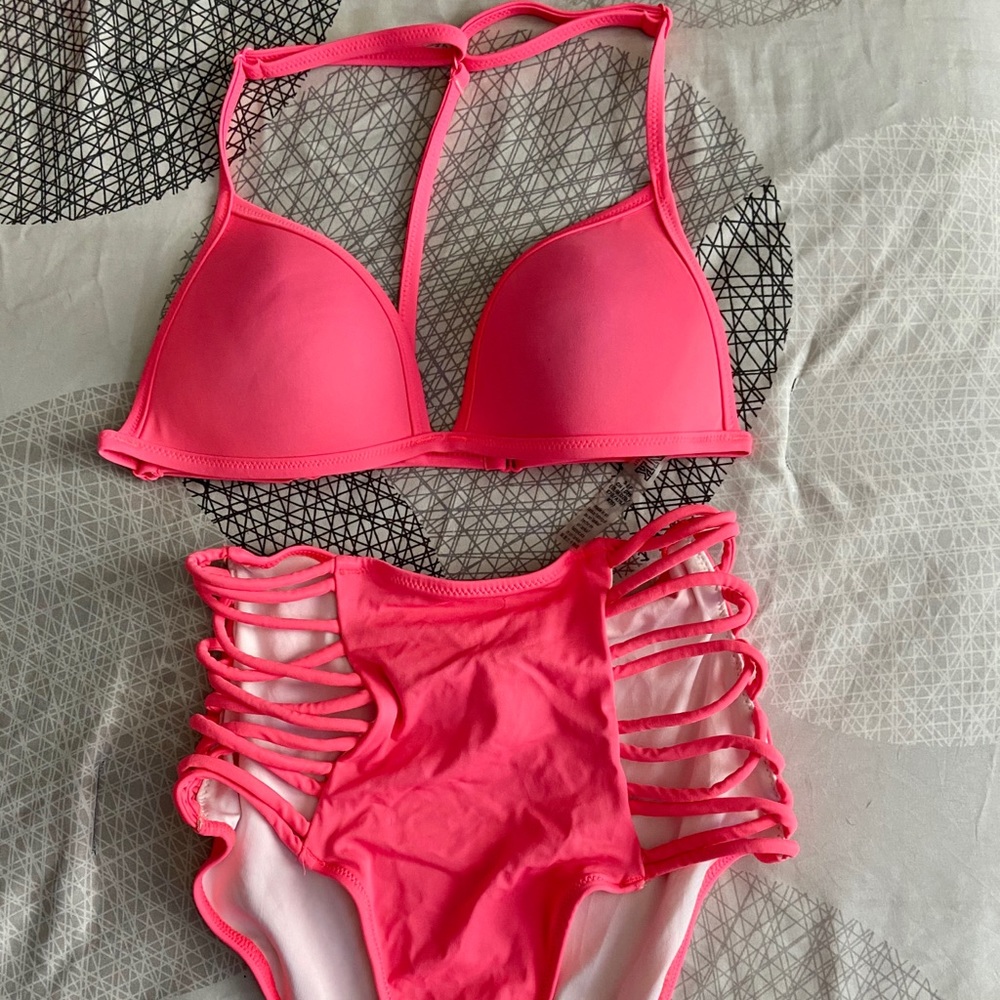 Neon orange high waisted bottoms, push up top
